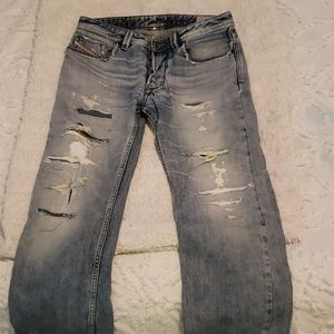 DIESEL "LARKEE" MENS DISTRESSED JEANS WITH PATCHES